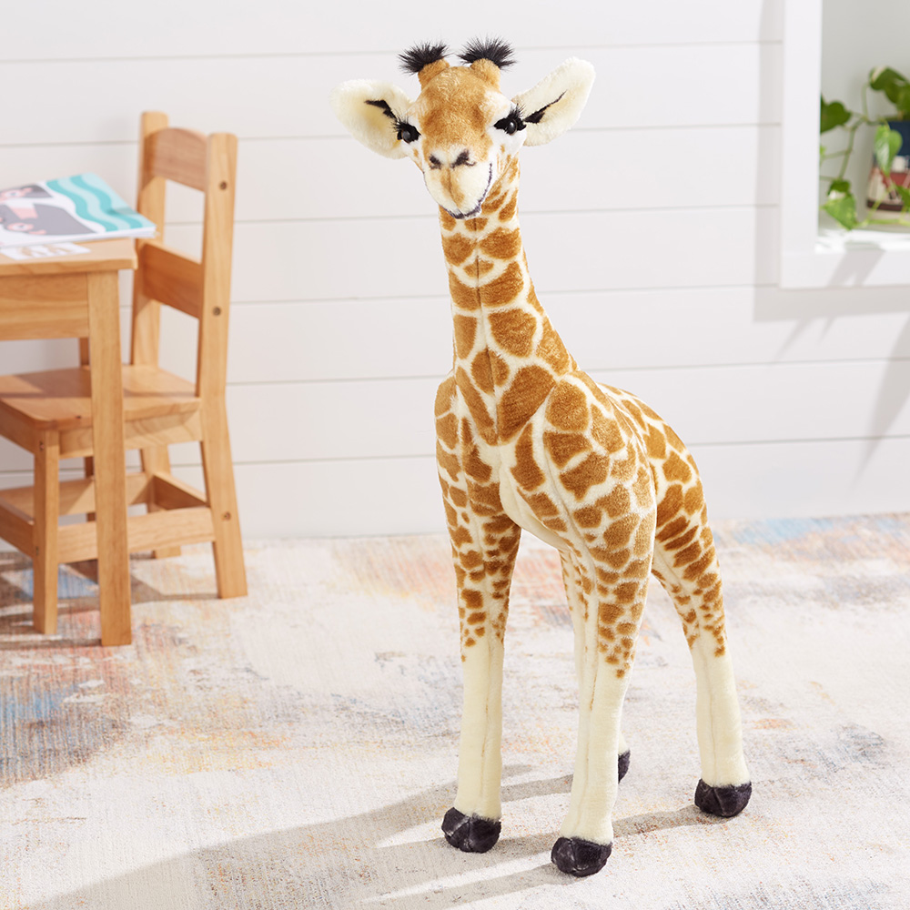 Commercial studio product photography in Westchester, New York of baby giraffe