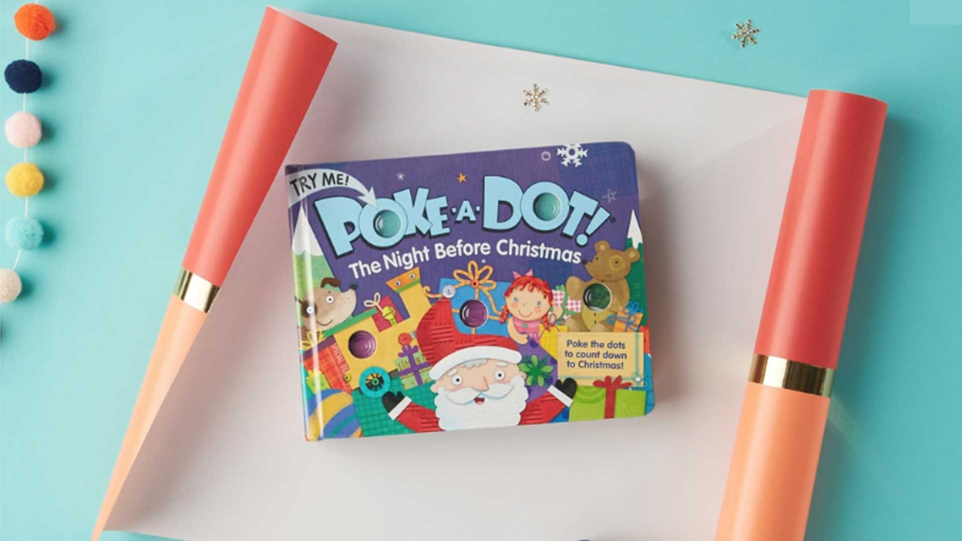 Commercial studio product photography and video production in Westchester, New York for Poke a Dot book gift wrapped